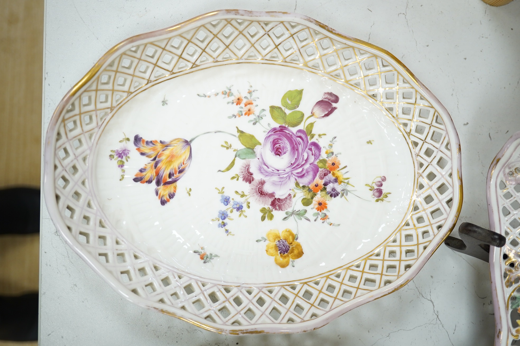 Three Potschappel flower painted reticulated dishes, largest 24.5 x 24.5cm. Condition - fair to good